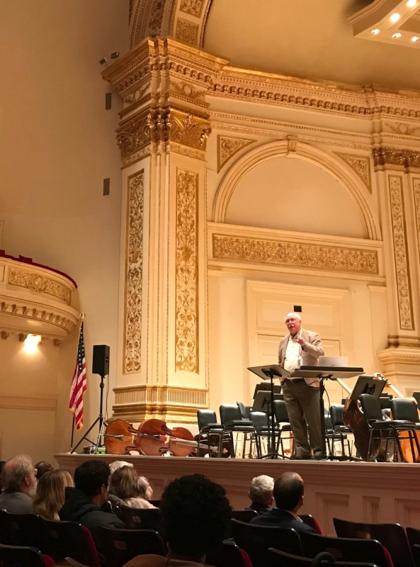Jan giving a preconcert lecture at Carnegie Hall